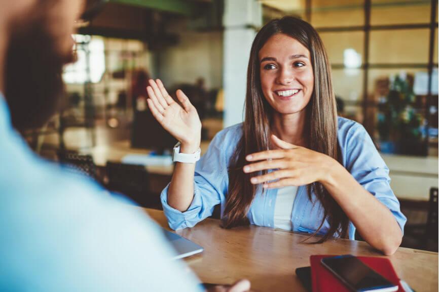 interviewee happily explains something